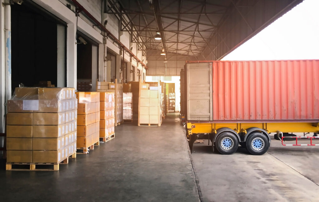 Cargo Container Truck Parked Loading at Dock Warehouse